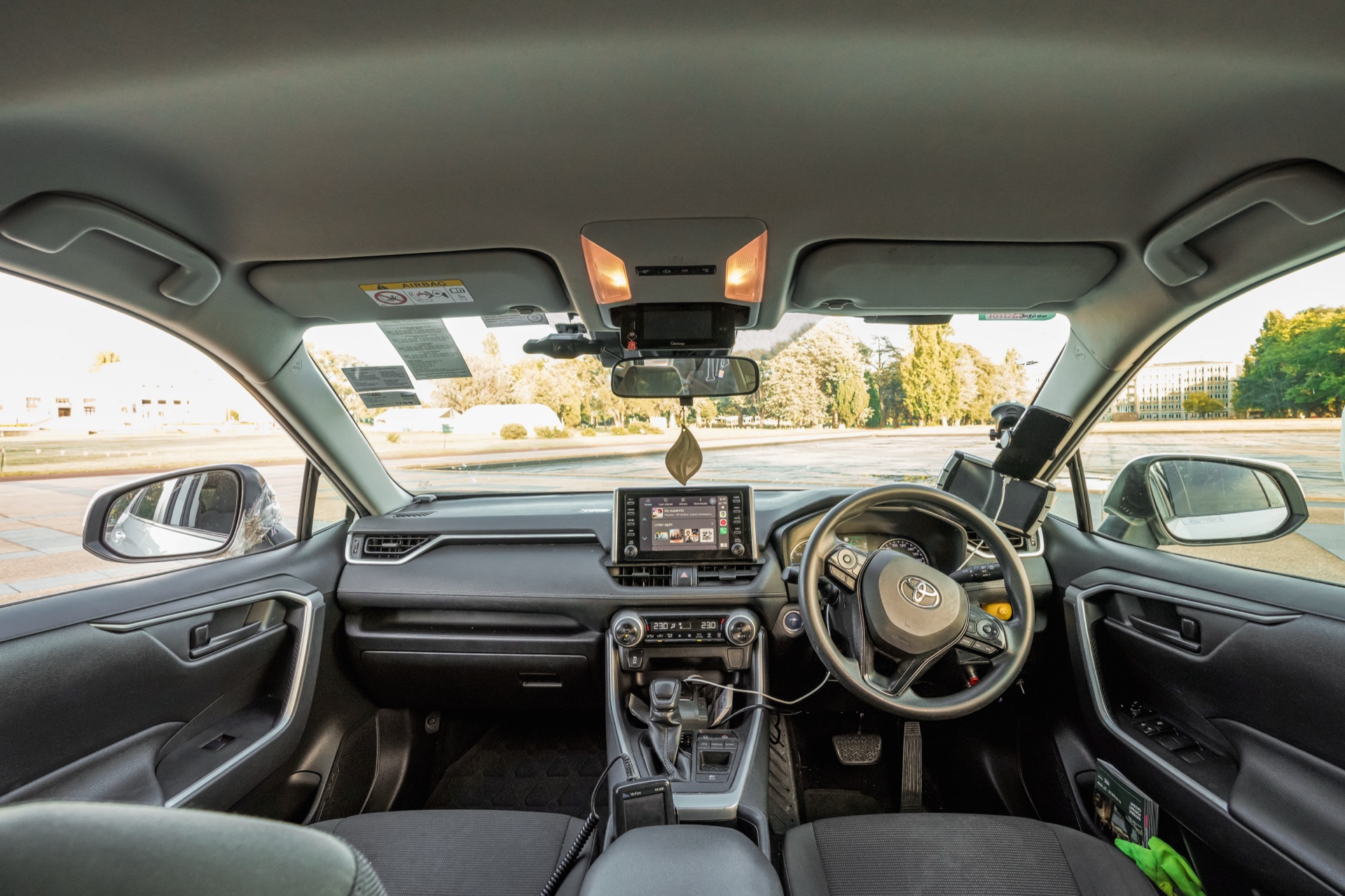 EZY CABS vehicle interior — clean dashboard, modern infotainment